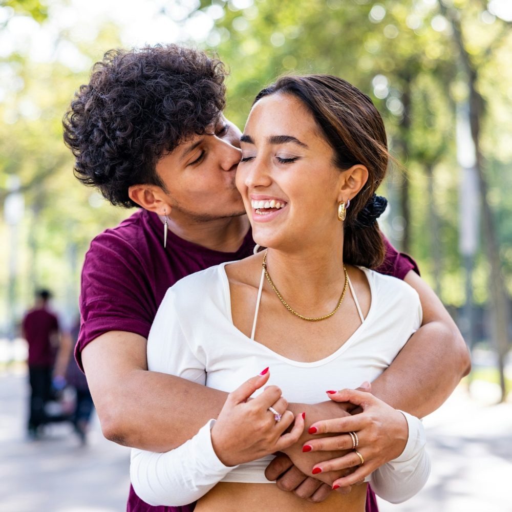 Happy couple hugging and smiling